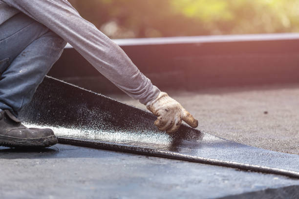 Professional Exterior Waterproofing technician working in Winona Lake, IN